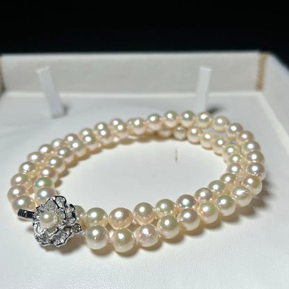 Aoya pearl necklace with 6.4-6.8mm white Akoya pearls and silver Teri wrap, 42.5 cm length