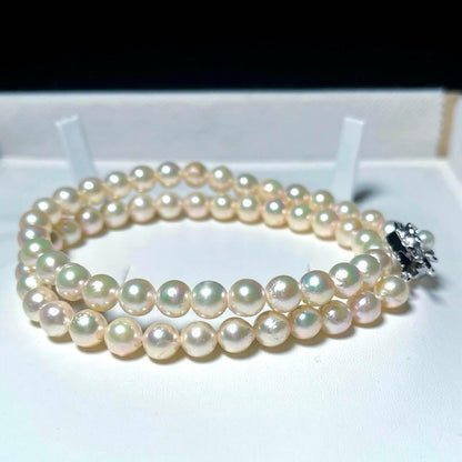 Aoya pearl necklace with 6.4-6.8mm white Akoya pearls and silver Teri wrap, 42.5 cm length