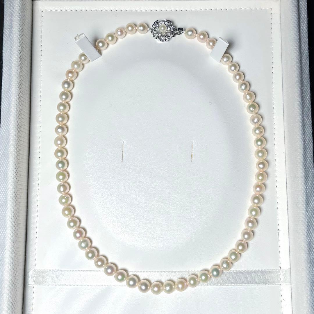 Aoya pearl necklace with 6.4-6.8mm white Akoya pearls and silver Teri wrap, 42.5 cm length