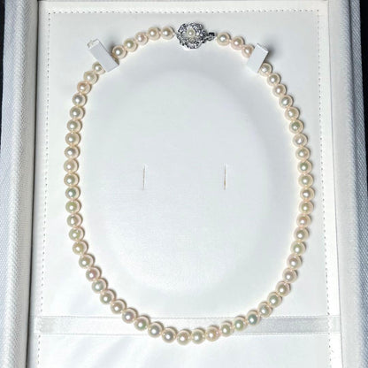 Aoya pearl necklace with 6.4-6.8mm white Akoya pearls and silver Teri wrap, 42.5 cm length