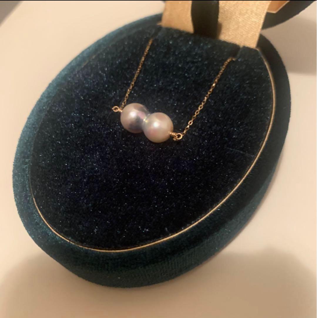 Twin Akoya pearl necklace with 10K gold chain and deep sea-inspired design