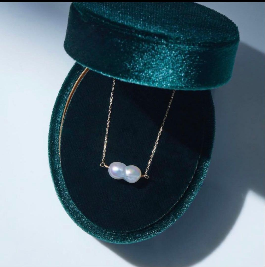 Twin Akoya pearl necklace with 10K gold chain and deep sea-inspired design