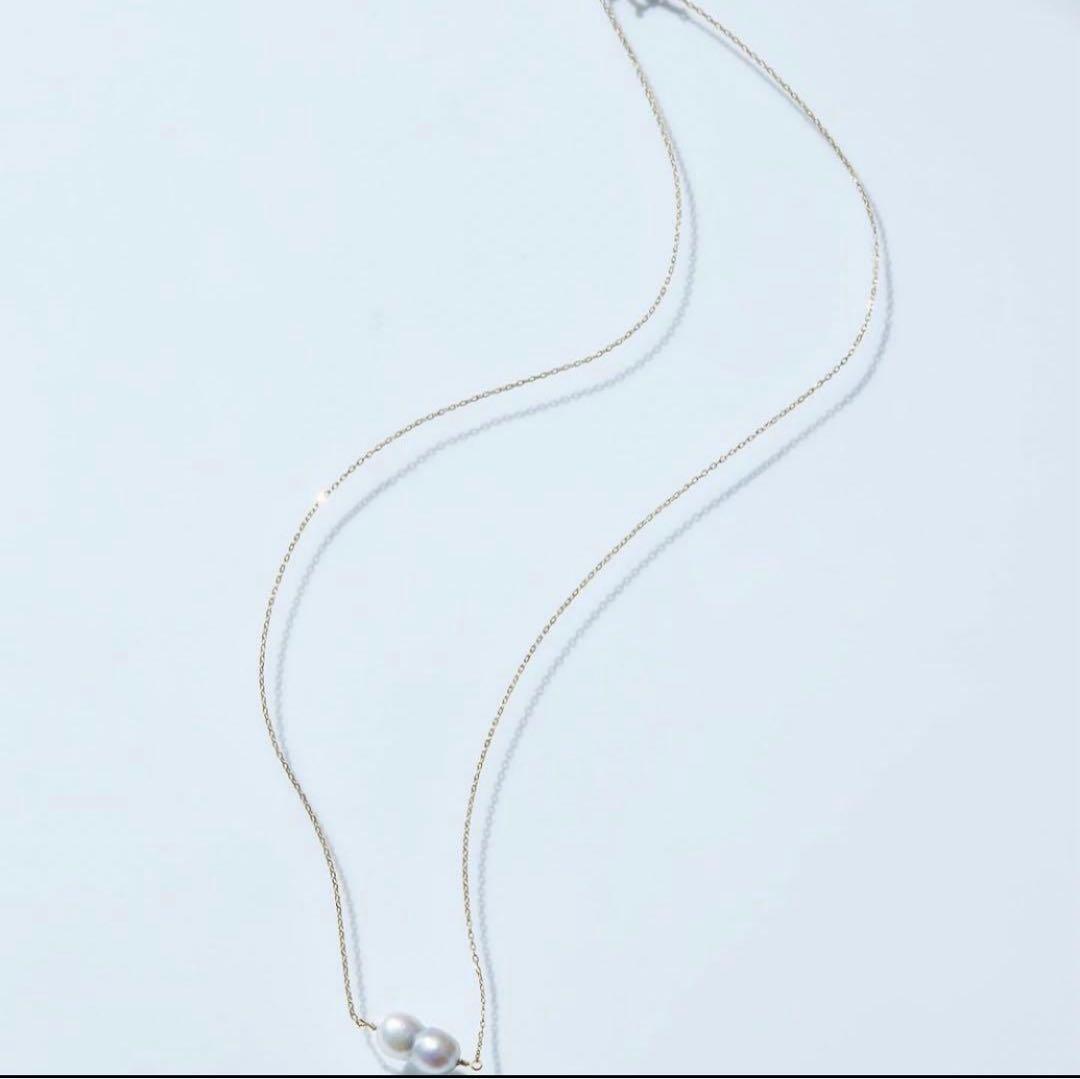 Twin Akoya pearl necklace with 10K gold chain and deep sea-inspired design