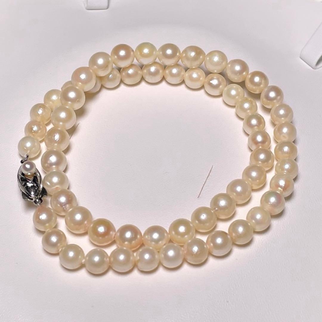 Akoya pearl necklace with 5.8-6.8mm round white pearls on a 16 inch silver chain