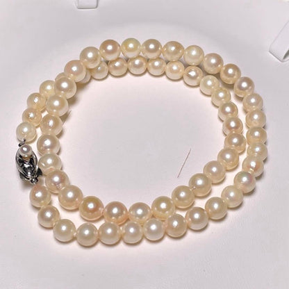 Akoya pearl necklace with 5.8-6.8mm round white pearls on a 16 inch silver chain