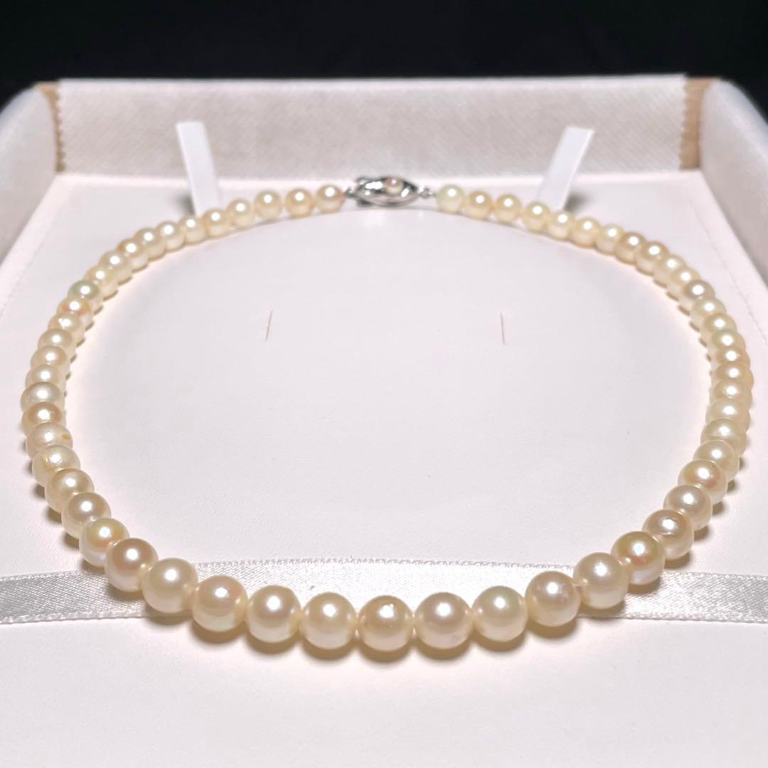 Akoya pearl necklace with 5.8-6.8mm round white pearls on a 16 inch silver chain