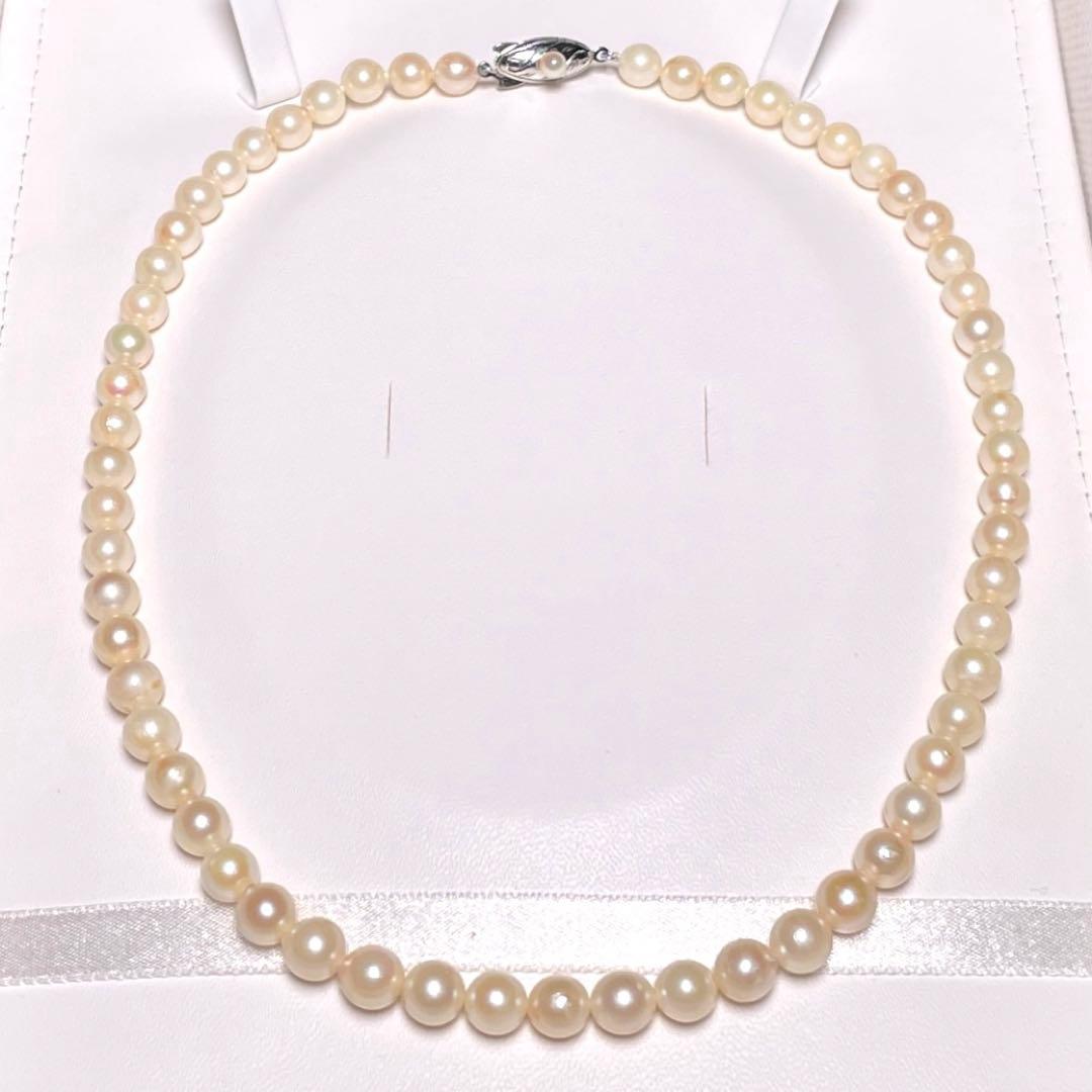 Akoya pearl necklace with 5.8-6.8mm round white pearls on a 16 inch silver chain
