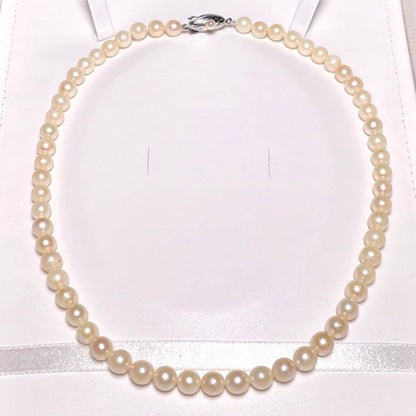 Akoya pearl necklace with 5.8-6.8mm round white pearls on a 16 inch silver chain