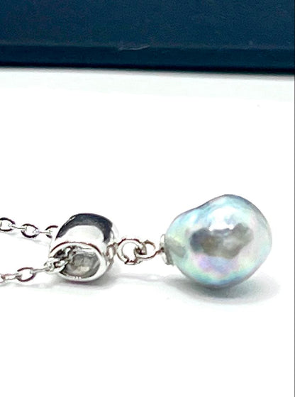 Akoya pearl necklace with natural blue rainbow-colored baroque pearl on stainless steel chain