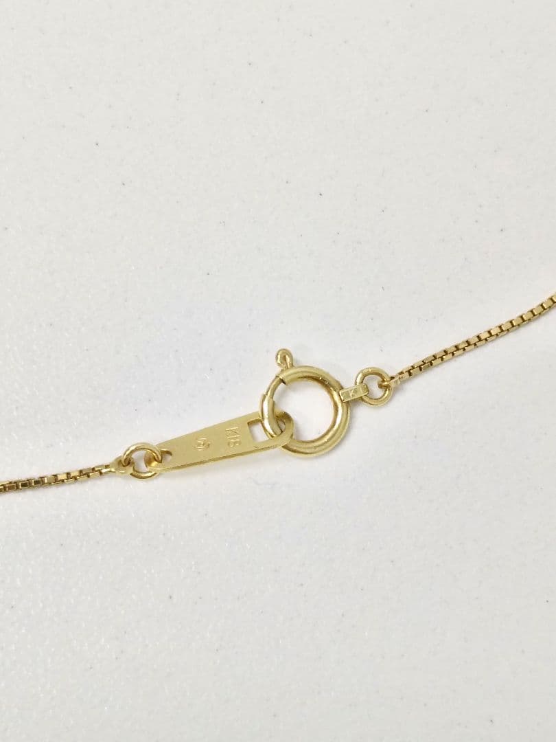 K18 Tasaki single pearl necklace with calm tone pearl on gold chain