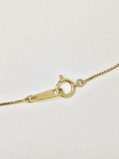 K18 Tasaki single pearl necklace with calm tone pearl on gold chain