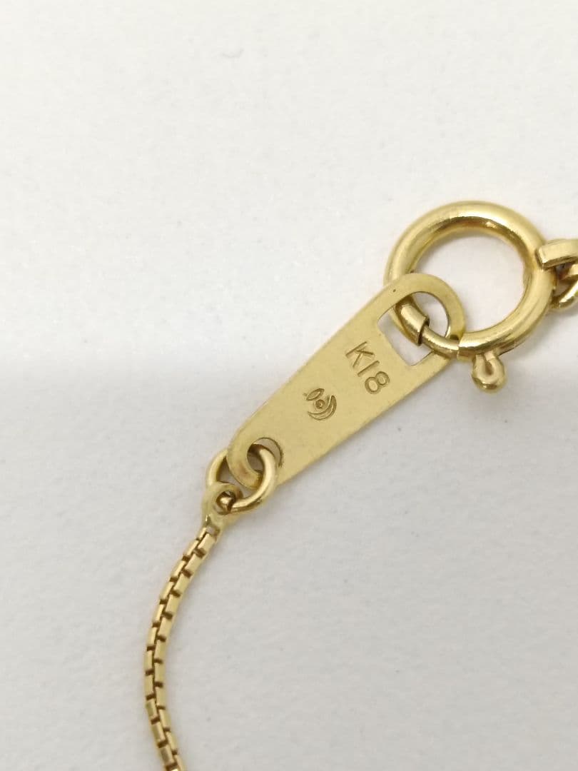 K18 Tasaki single pearl necklace with calm tone pearl on gold chain