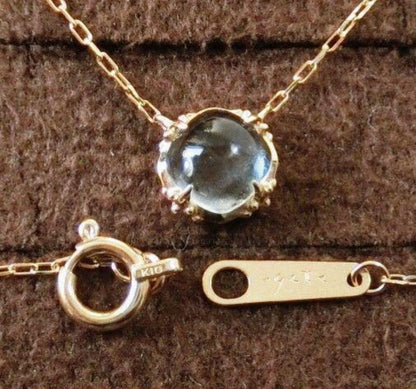 Agate Aquamarine K10 Necklace with cabochon cut pale blue aquamarine pendant on a delicate gold chain