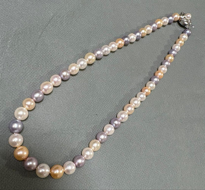 Tasaki multi-color pearl necklace with pearls in white, cream, beige, and purple gray, 42 cm length