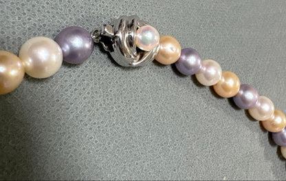 Tasaki multi-color pearl necklace with pearls in white, cream, beige, and purple gray, 42 cm length