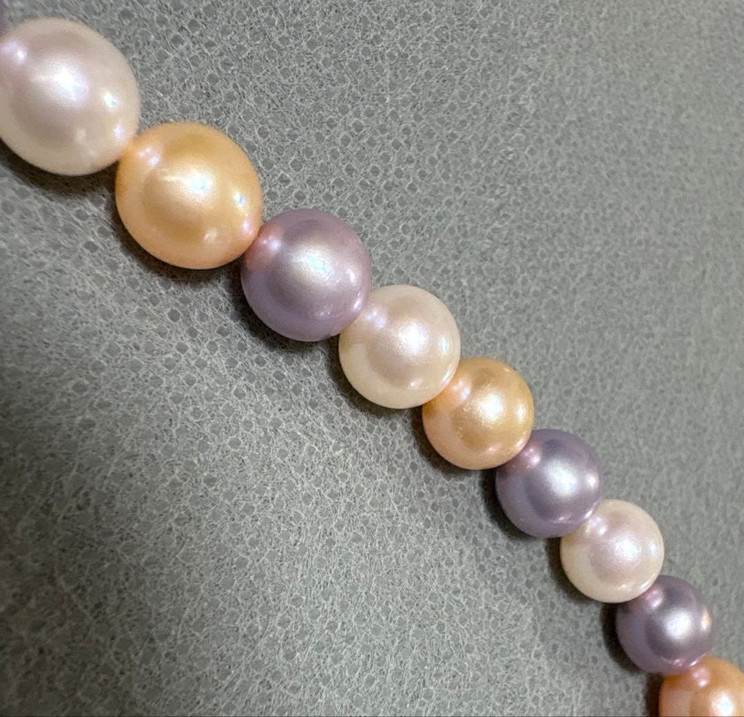 Tasaki multi-color pearl necklace with pearls in white, cream, beige, and purple gray, 42 cm length