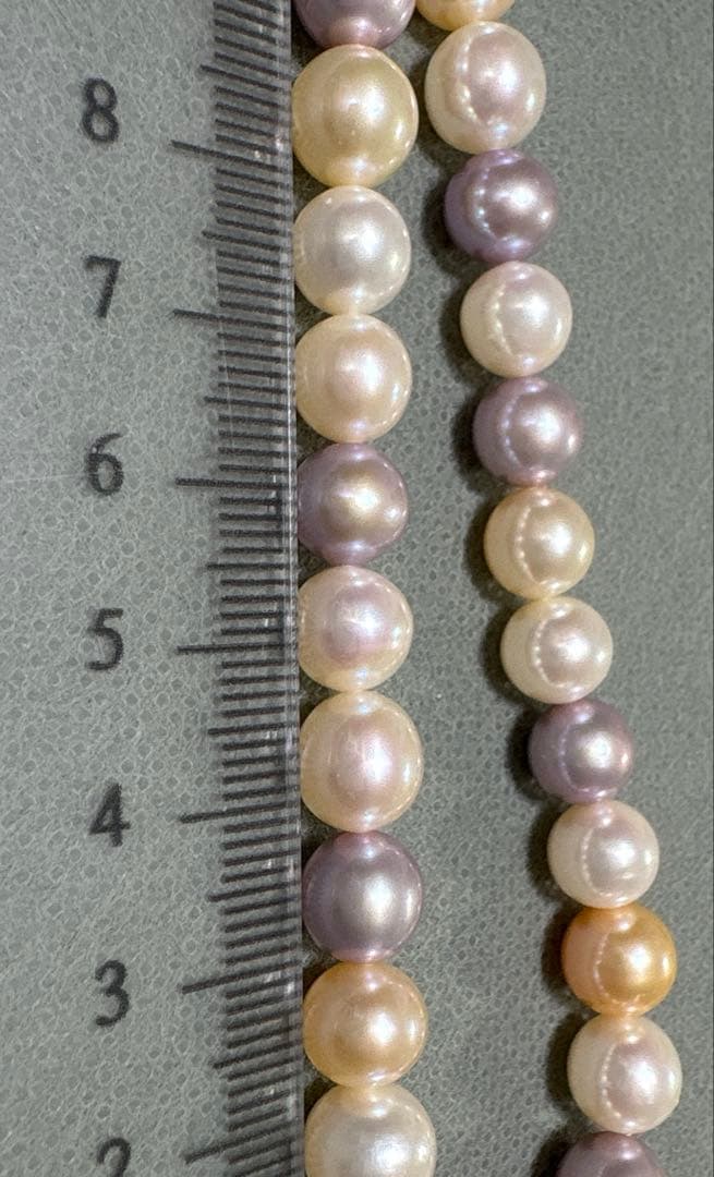 Tasaki multi-color pearl necklace with pearls in white, cream, beige, and purple gray, 42 cm length