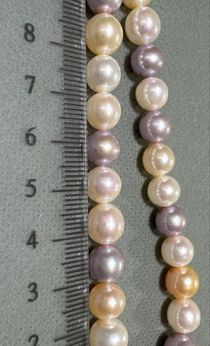 Tasaki multi-color pearl necklace with pearls in white, cream, beige, and purple gray, 42 cm length