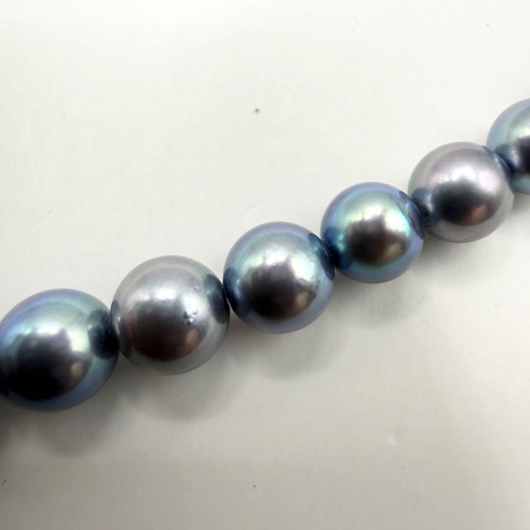 Akoya pearl necklace with metallic blue gradient baby pearls sized 3 to 7 mm on a 44 cm chain