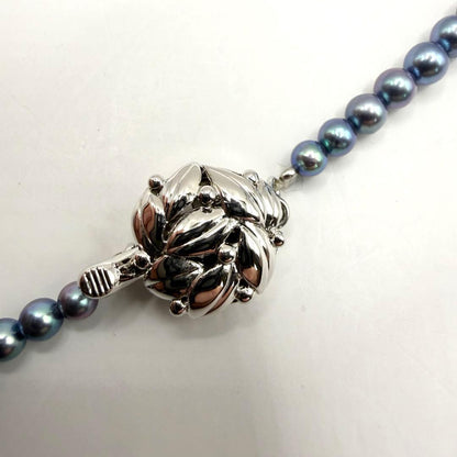 Akoya pearl necklace with metallic blue gradient baby pearls sized 3 to 7 mm on a 44 cm chain
