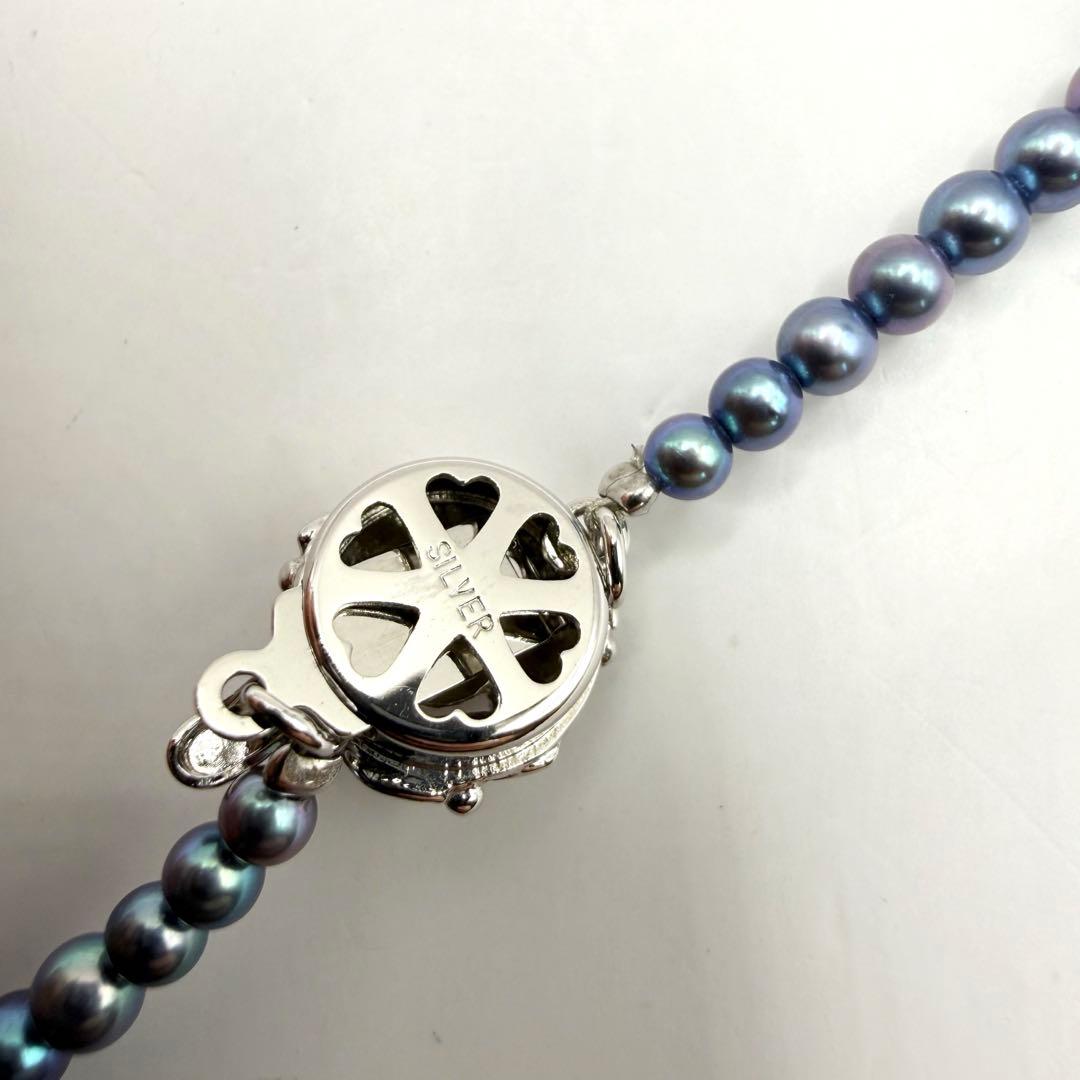 Akoya pearl necklace with metallic blue gradient baby pearls sized 3 to 7 mm on a 44 cm chain