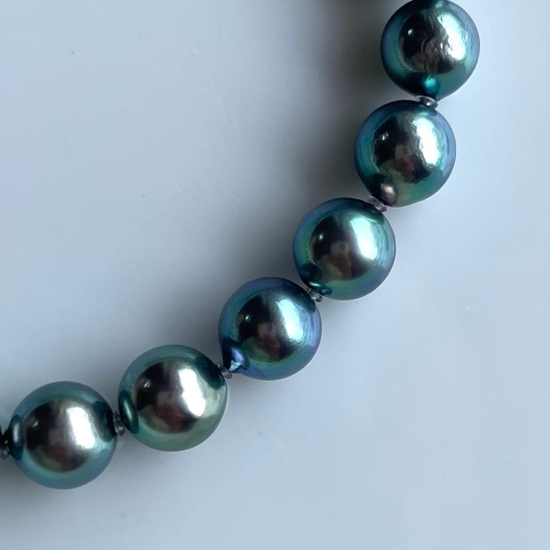 Akoya Pearl Black Necklace with 7.5-8mm pearls and silver clasp displayed on white background