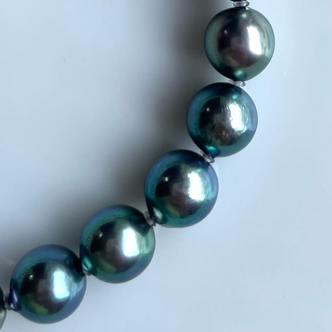 Akoya Pearl Black Necklace with 7.5-8mm pearls and silver clasp displayed on white background
