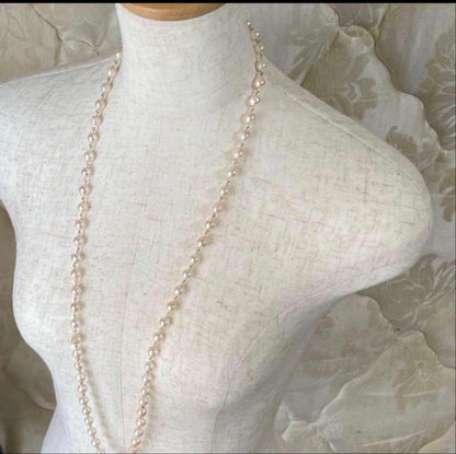 Downton Abbey style play set displayed with an 85 cm Akoya pearl long necklace of large baroque pearls