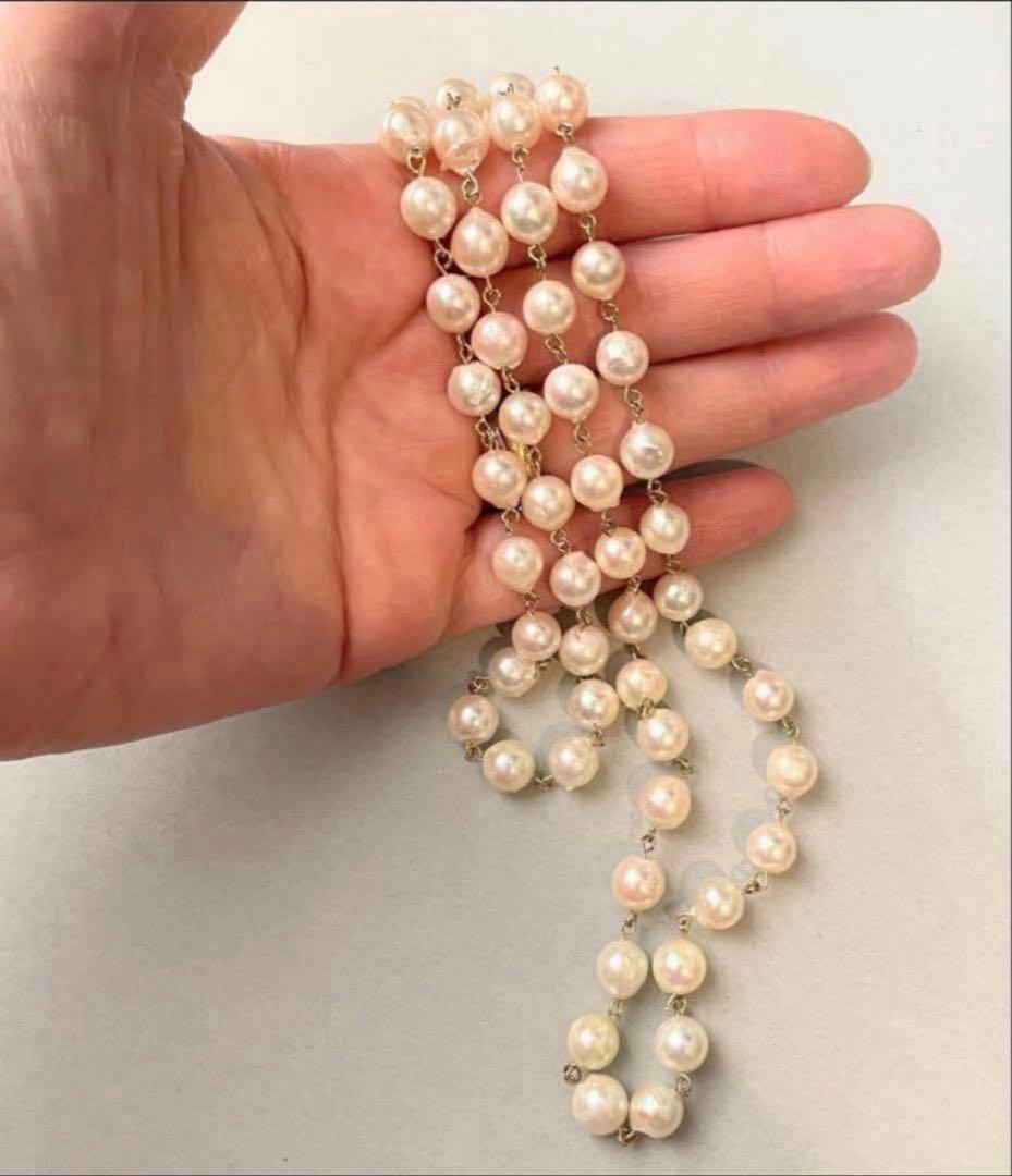Downton Abbey style play set displayed with an 85 cm Akoya pearl long necklace of large baroque pearls