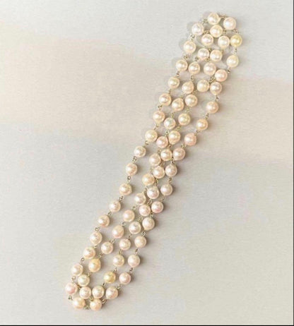 Downton Abbey style play set displayed with an 85 cm Akoya pearl long necklace of large baroque pearls