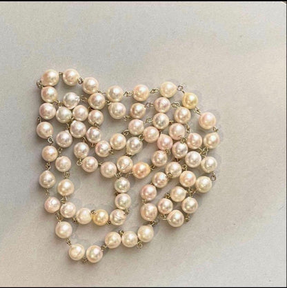 Downton Abbey style play set displayed with an 85 cm Akoya pearl long necklace of large baroque pearls