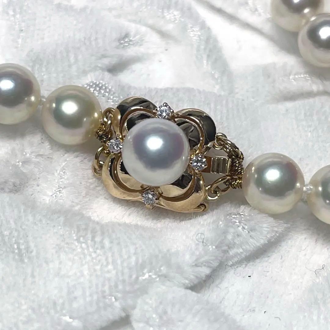 Mikimoto K18 Akoya Pearl Necklace featuring 6.5-7.0mm pearls and four diamond side stones on 44.5cm chain