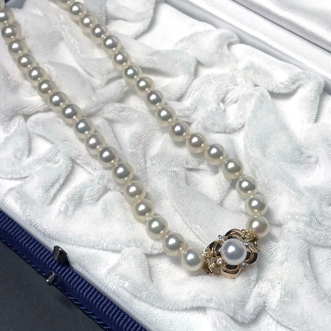 Mikimoto K18 Akoya Pearl Necklace featuring 6.5-7.0mm pearls and four diamond side stones on 44.5cm chain