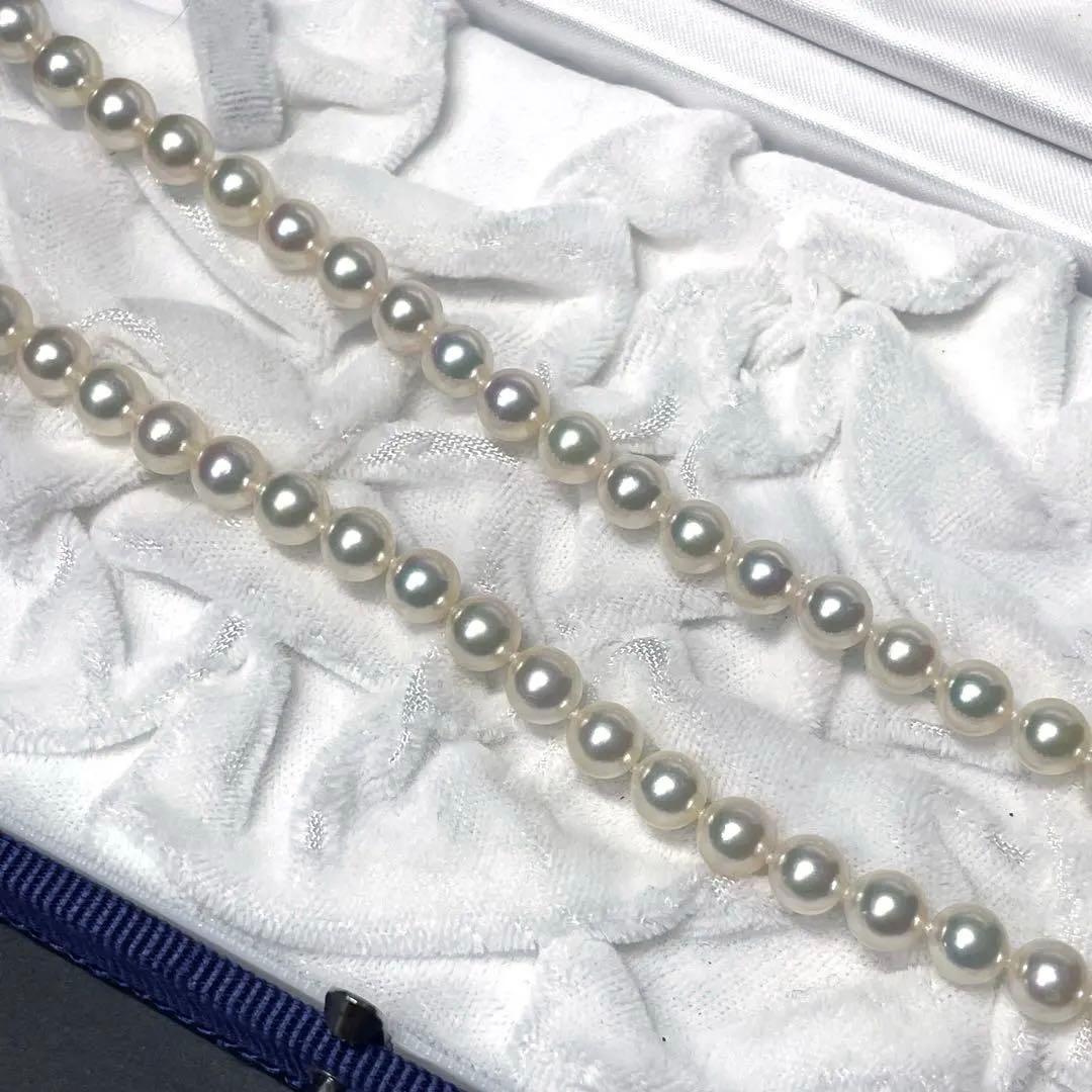 Mikimoto K18 Akoya Pearl Necklace featuring 6.5-7.0mm pearls and four diamond side stones on 44.5cm chain
