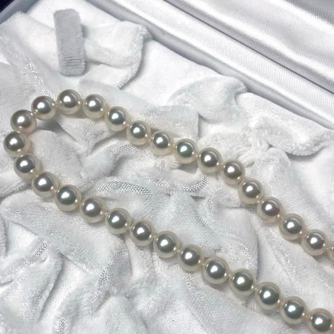 Mikimoto K18 Akoya Pearl Necklace featuring 6.5-7.0mm pearls and four diamond side stones on 44.5cm chain