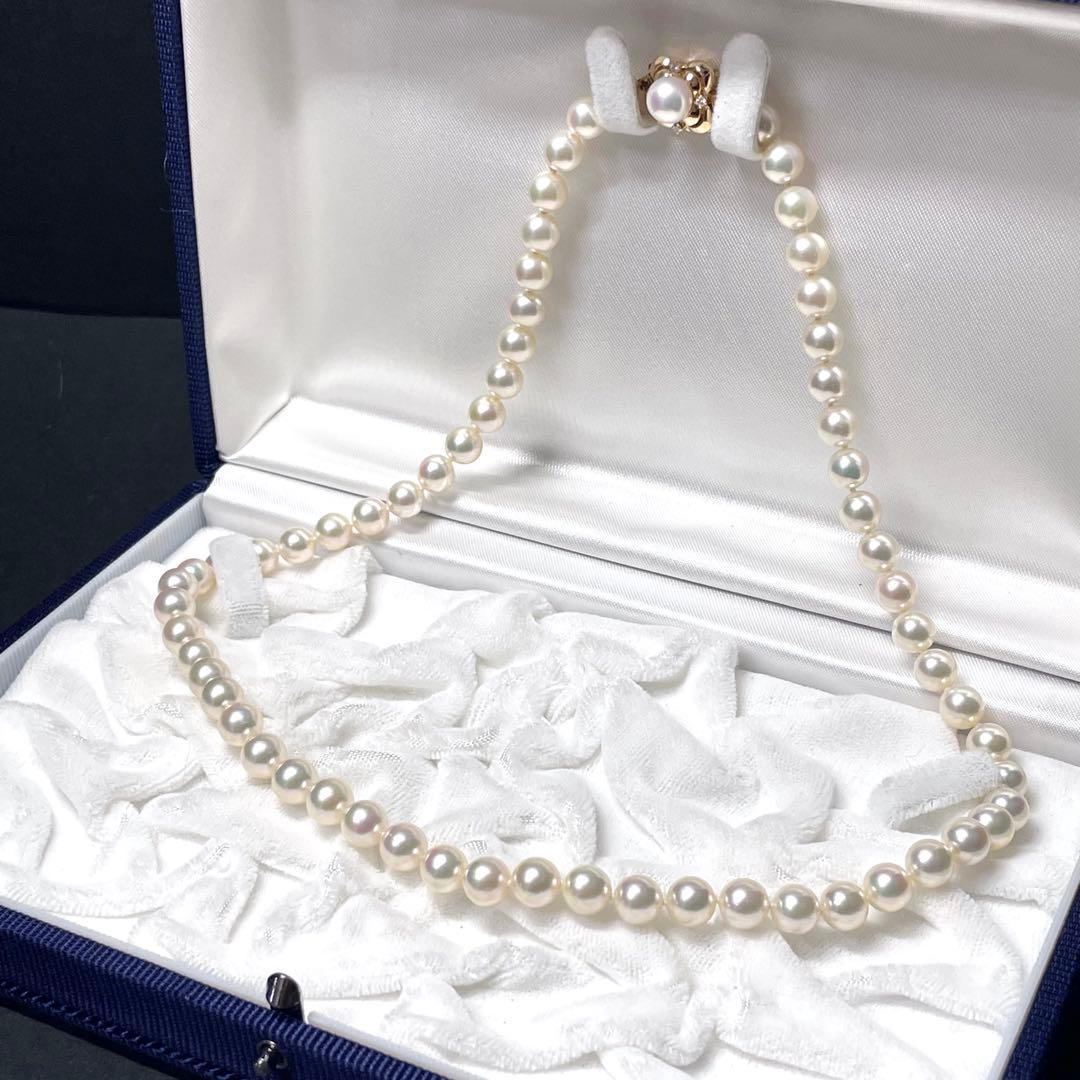 Mikimoto K18 Akoya Pearl Necklace featuring 6.5-7.0mm pearls and four diamond side stones on 44.5cm chain