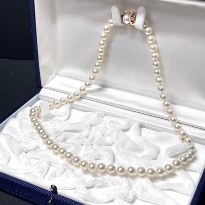 Mikimoto K18 Akoya Pearl Necklace featuring 6.5-7.0mm pearls and four diamond side stones on 44.5cm chain