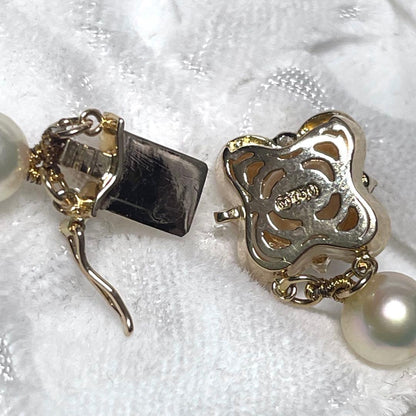 Mikimoto K18 Akoya Pearl Necklace featuring 6.5-7.0mm pearls and four diamond side stones on 44.5cm chain