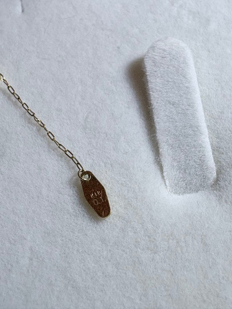 agete diamond necklace with 0.1CT carat weight crafted in K18 gold on a white background