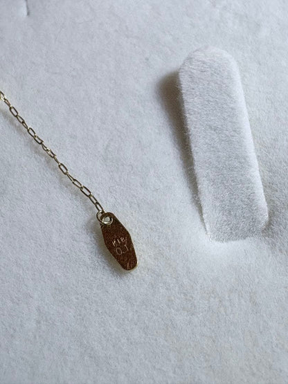 agete diamond necklace with 0.1CT carat weight crafted in K18 gold on a white background