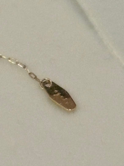 agete diamond necklace with 0.1CT carat weight crafted in K18 gold on a white background