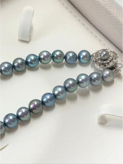 Akoya pearl necklace with blue-gray round pearls 8.0-8.5mm on silver clasp, 43cm length