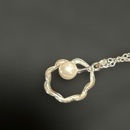 Mikimoto Akoya pearl pendant necklace with 7mm pearl on a silver chain 45cm long