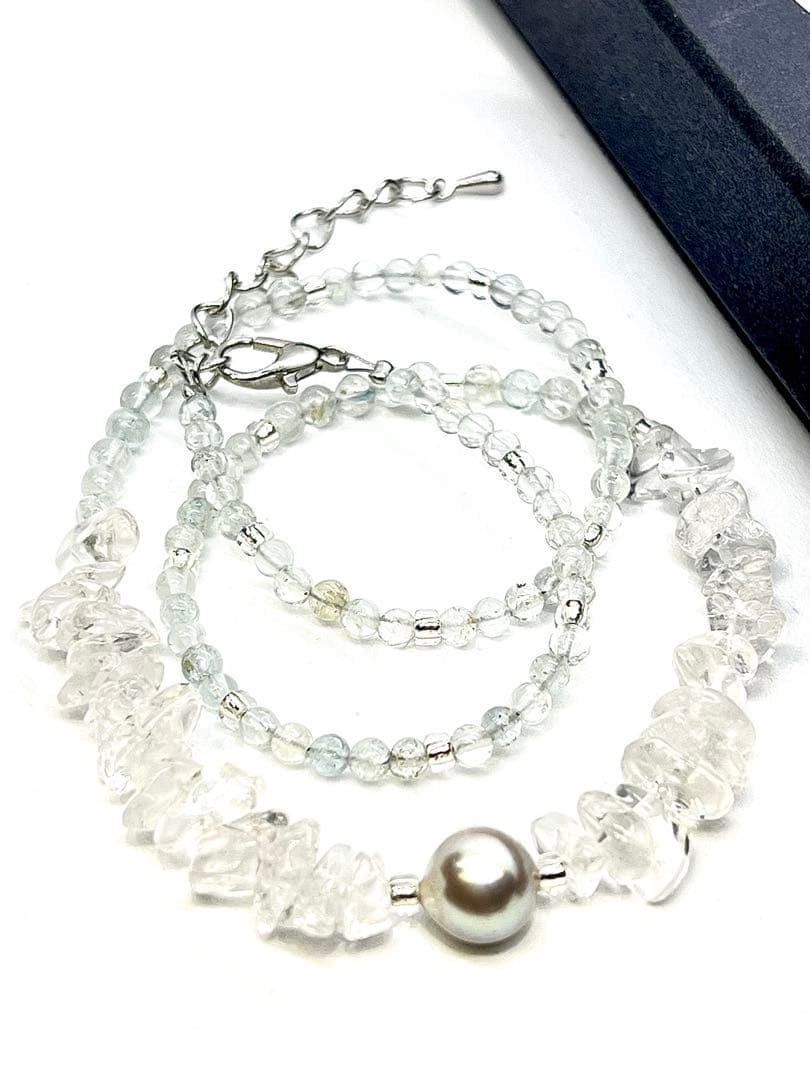 Akoya pearl necklace featuring natural 8.3 mm pearls and 3-4 mm aquamarine stones on a 40-45 cm chain