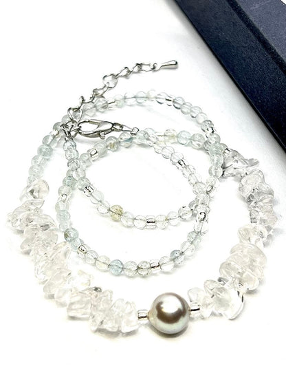 Akoya pearl necklace featuring natural 8.3 mm pearls and 3-4 mm aquamarine stones on a 40-45 cm chain