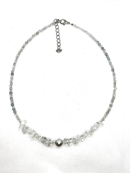 Akoya pearl necklace featuring natural 8.3 mm pearls and 3-4 mm aquamarine stones on a 40-45 cm chain