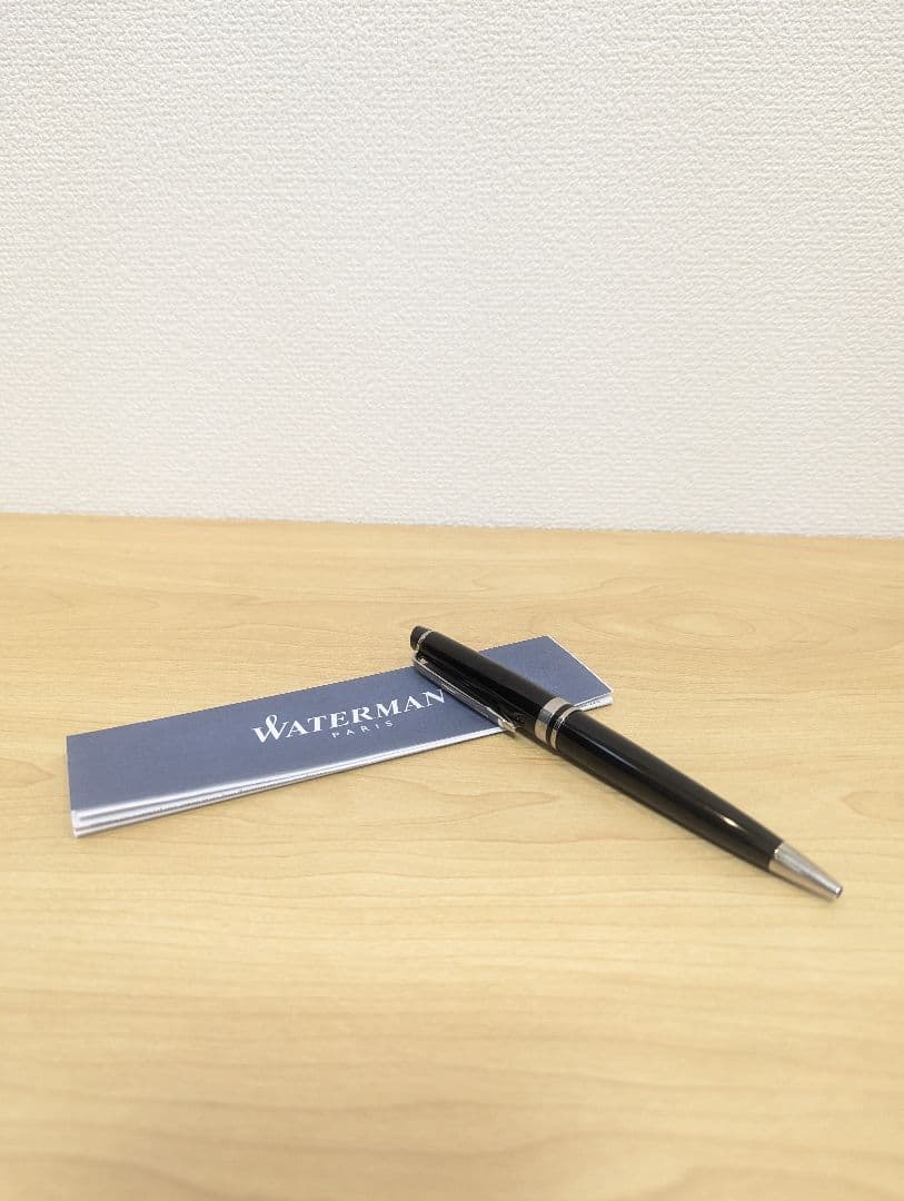 Waterman black and silver ballpoint pen with oil-based ink in a protective case with instruction manual