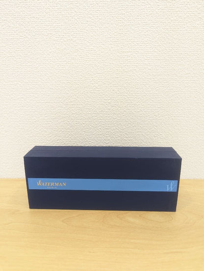 Waterman black and silver ballpoint pen with oil-based ink in a protective case with instruction manual