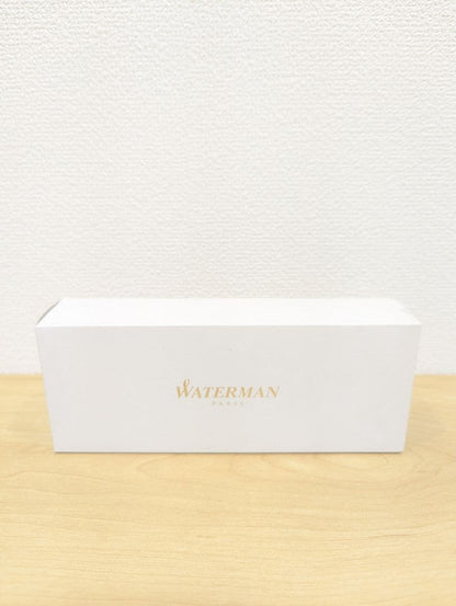 Waterman black and silver ballpoint pen with oil-based ink in a protective case with instruction manual