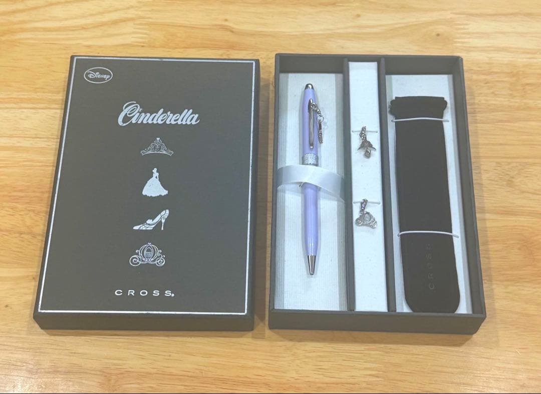 Cinderella Cross ballpoint pen in black with silver accents wrapped in protective pouch